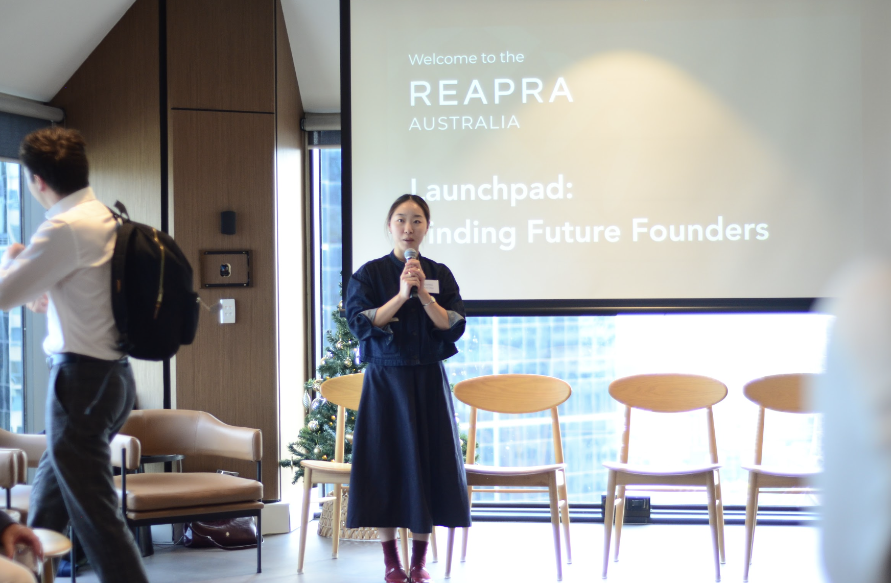 Skye Choi presents at a Reapra Launchpad event in Sydney